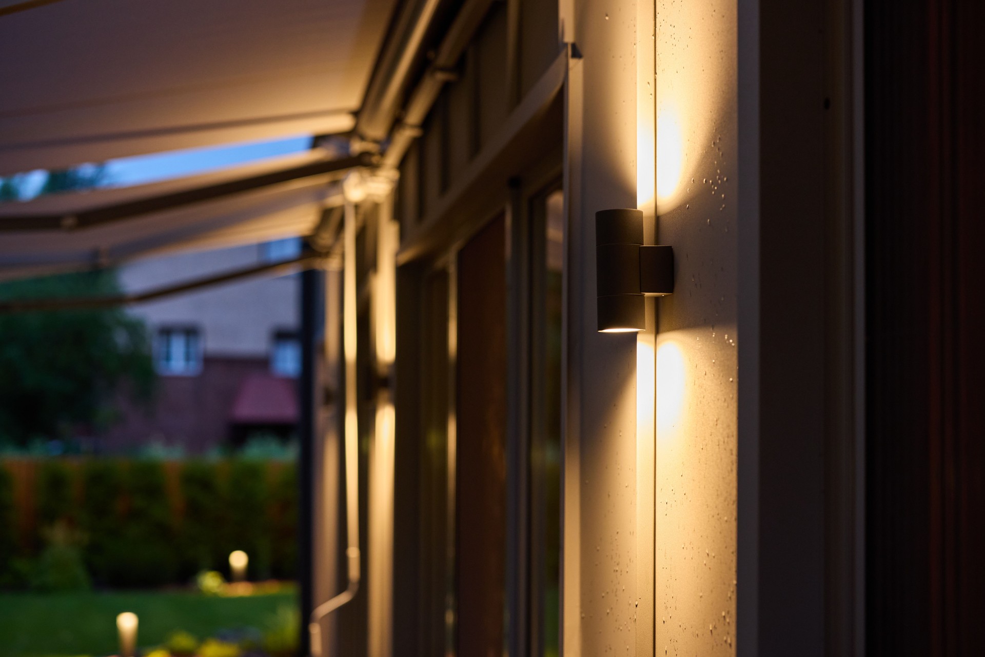 Experience the beauty of elegant exterior lighting during the serene moments of dusk